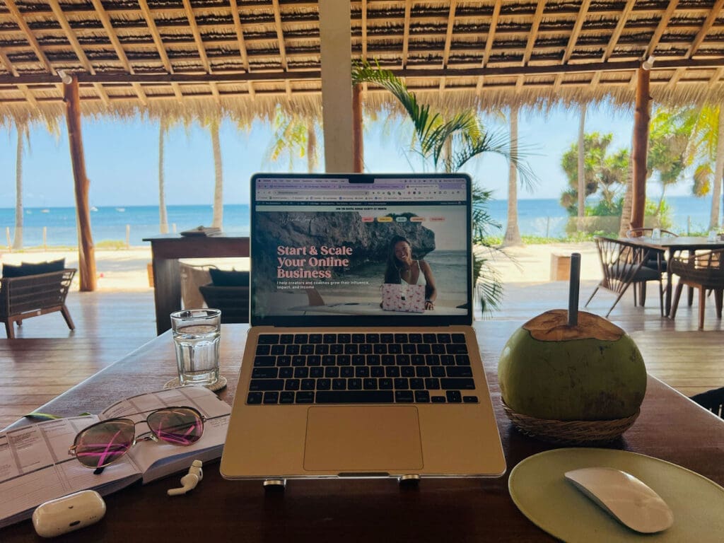 Laptop lifestyle with coconut in the tropics