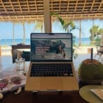 Laptop lifestyle with coconut in the tropics
