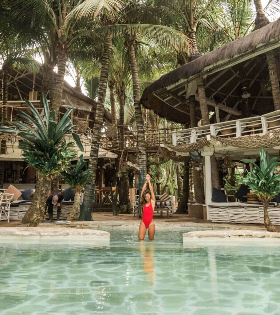 Girl with red bikini standing in La Brisa Pool