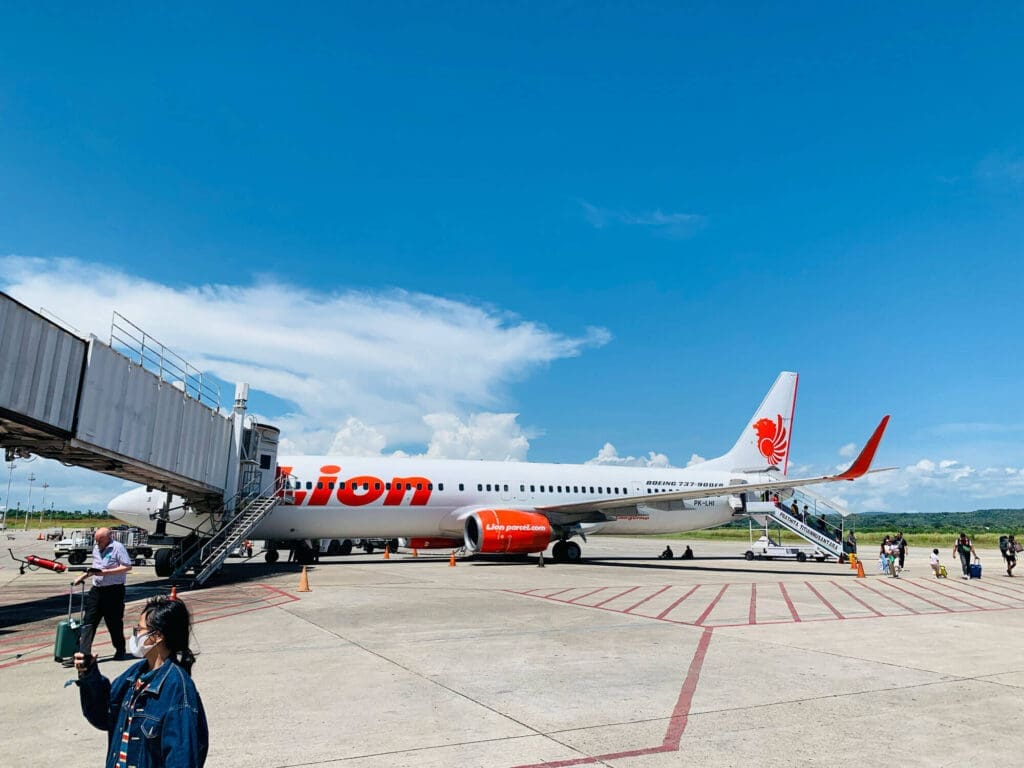 White airplane on the runway to Rote Island Indonesia