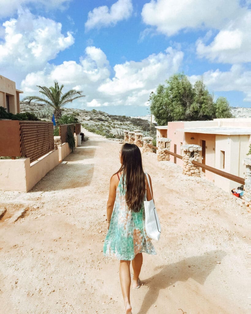 Girl walking along the roads of Malta