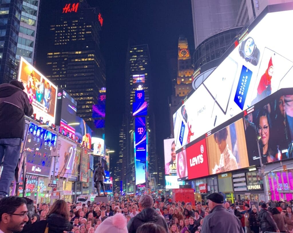 Times Square New York filled with people during Christmas