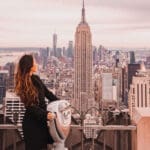 Girl on top of the Empire State Building