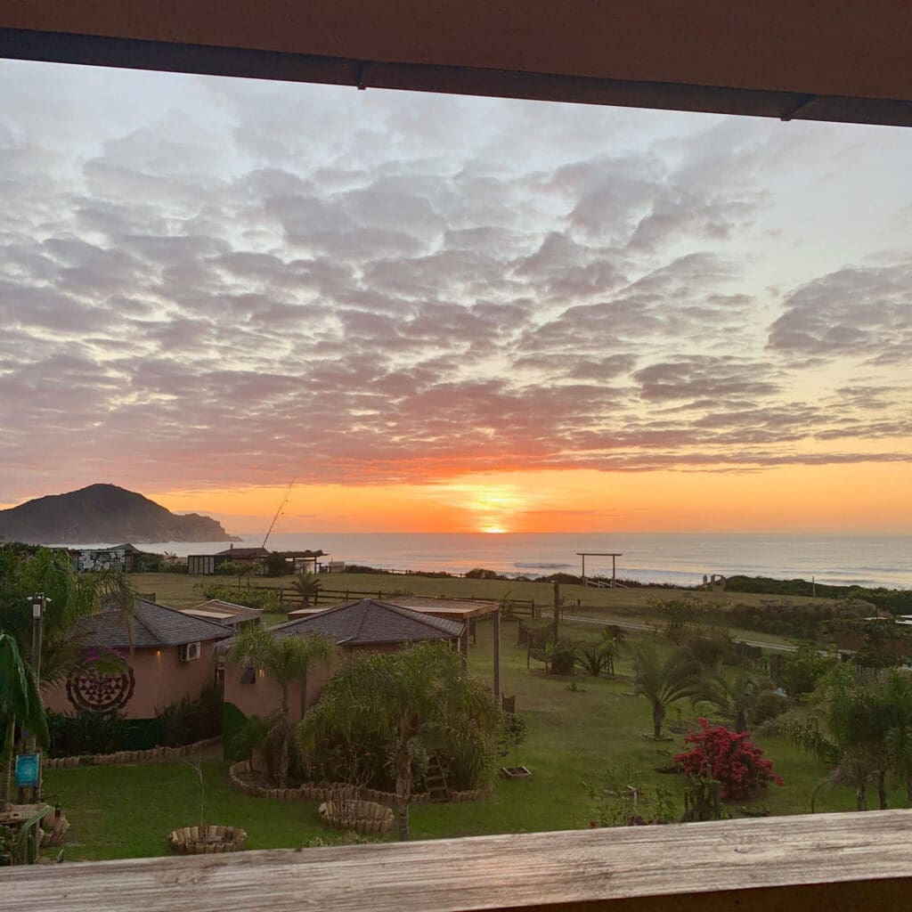 Sunrise from the balcony at Praia do Rosa pousada