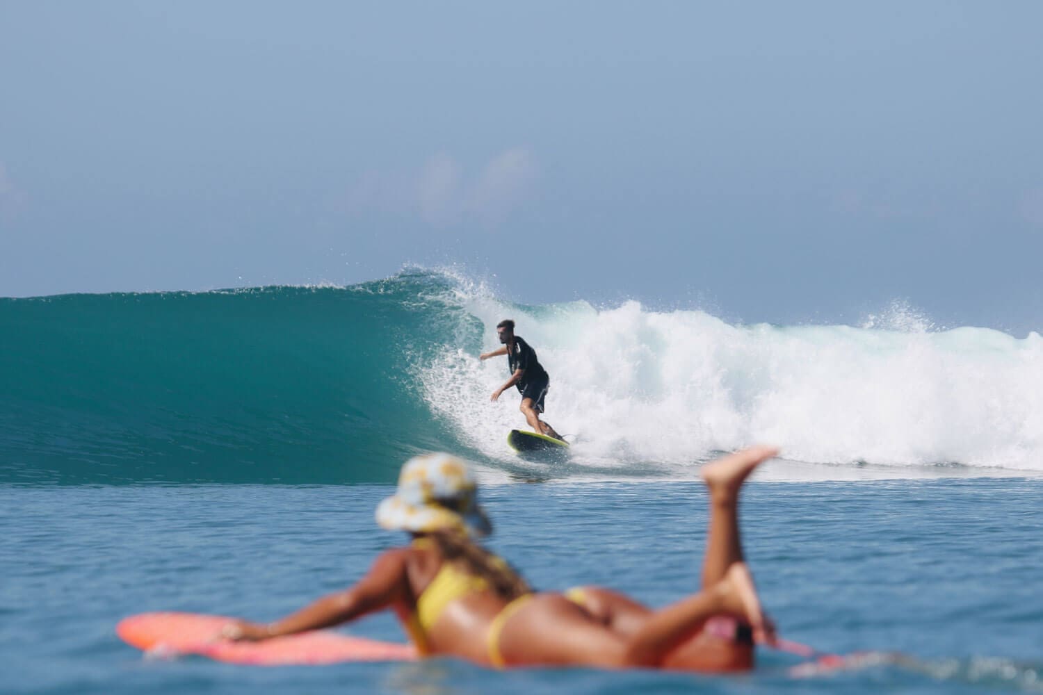 Couple surfing Nias Indonesia