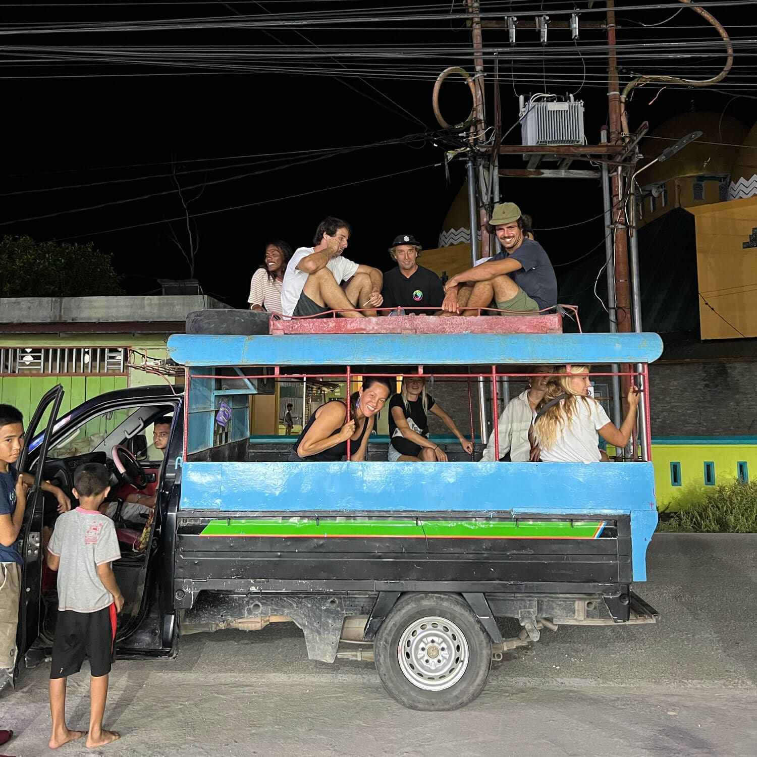 People in a combi van transportation in Nias