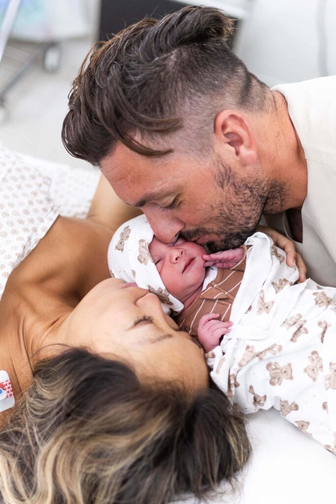 Danielle, Ragz, and baby Leven right after birth